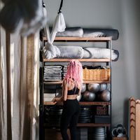 Portrait of a smiling yoga instructor named Ximena.